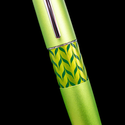 Close-up of green leaf pattern barrel band on Pilot Metropolitan Pop Ballpoint Pen in metallic green finish