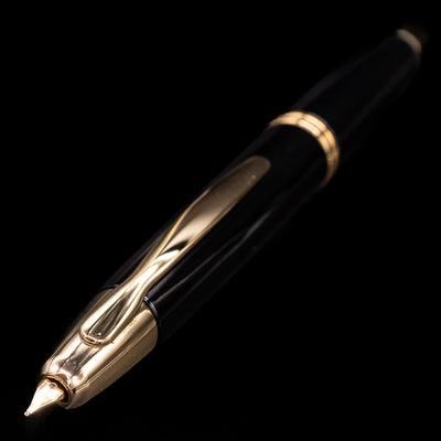 Close-up of the Pilot Vanishing Point Fountain Pen in black and gold showing retracted nib and clip detail