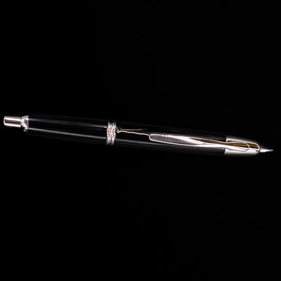 Full side profile of the Pilot Vanishing Point Decimo Fountain Pen in Black and Rhodium showing sleek shape and retracted nib