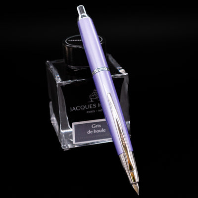 Pilot Vanishing Point Decimo Fountain Pen in Purple shown with Jacques Herbin Gris de Houle ink and nib extended
