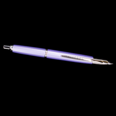 Side profile of the Pilot Vanishing Point Decimo Fountain Pen in Purple with nib extended