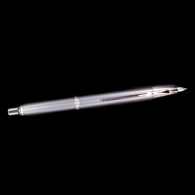 Side profile of the Pilot Vanishing Point Decimo Fountain Pen in Grey with nib extended