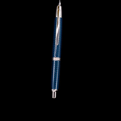 Full-length upright view of Pilot Vanishing Point Fountain Pen Blue Carbonesque with retracted nib