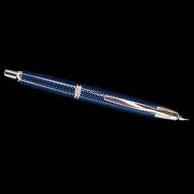 Side profile of Pilot Vanishing Point Fountain Pen Blue Carbonesque with nib extended and silver trim
