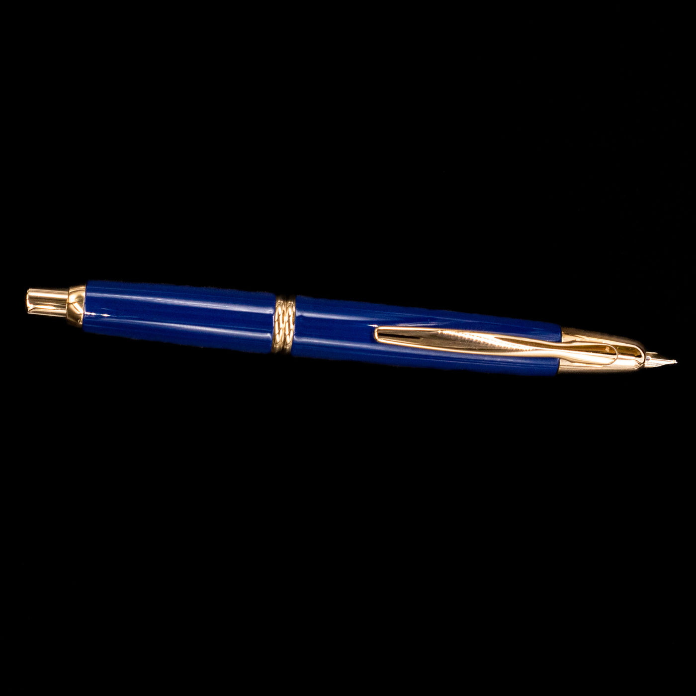Full side view of the Pilot Vanishing Point Fountain Pen in Blue with Gold Trim showing nib extended and body details