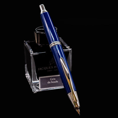Close-up of the Pilot Vanishing Point Fountain Pen in Blue with Rhodium trim, showcasing the retractable nib and sleek clip design.