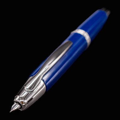 Detail view of the cap end and push-button mechanism of the Pilot Vanishing Point Fountain Pen in Blue with Rhodium accents.