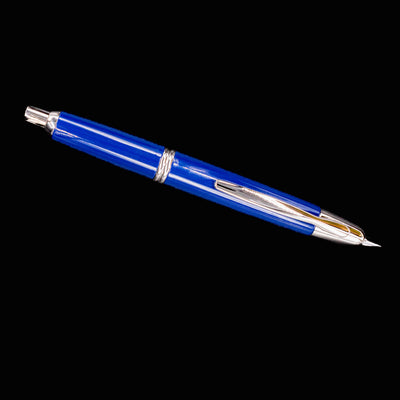 Full-length horizontal view of the Pilot Vanishing Point Fountain Pen in glossy blue with rhodium trim and retractable nib.