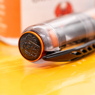 Pineider Mystery Fast Filler Fountain Pen - Orange (14k Nib) logo