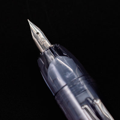 Close-up of the extra fine stainless steel nib on the Platinum Curidas Fountain Pen - Graphite Smoke.
