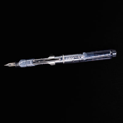 Side profile of the Platinum Curidas Fountain Pen - Graphite Smoke showcasing the clip, transparent construction, and engraved logo.
