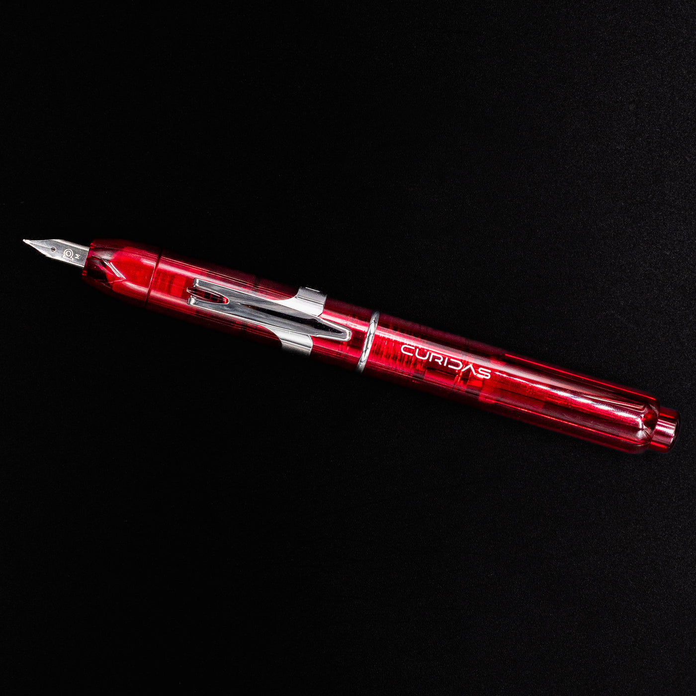 Full-length top-down view of Platinum Curidas Fountain Pen in Gran Red with chrome accents