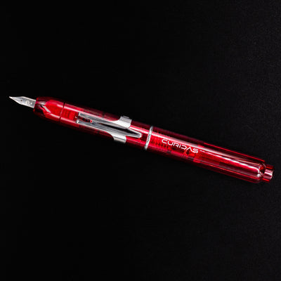 Full-length top-down view of Platinum Curidas Fountain Pen in Gran Red with chrome accents
