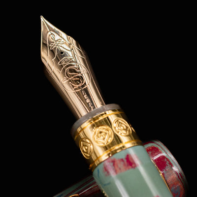 Close-up of the Santini Giant 8 Faceted Burano Fountain Pen nib, showcasing intricate gold engraving and decorative center band details.
