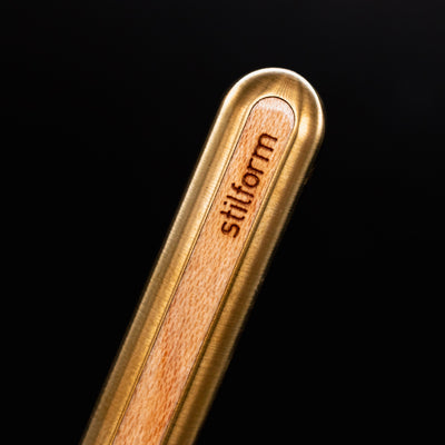 Stilform AEON Pencil Brass with Maple Veneer - closeup of Stilform logo on barrel