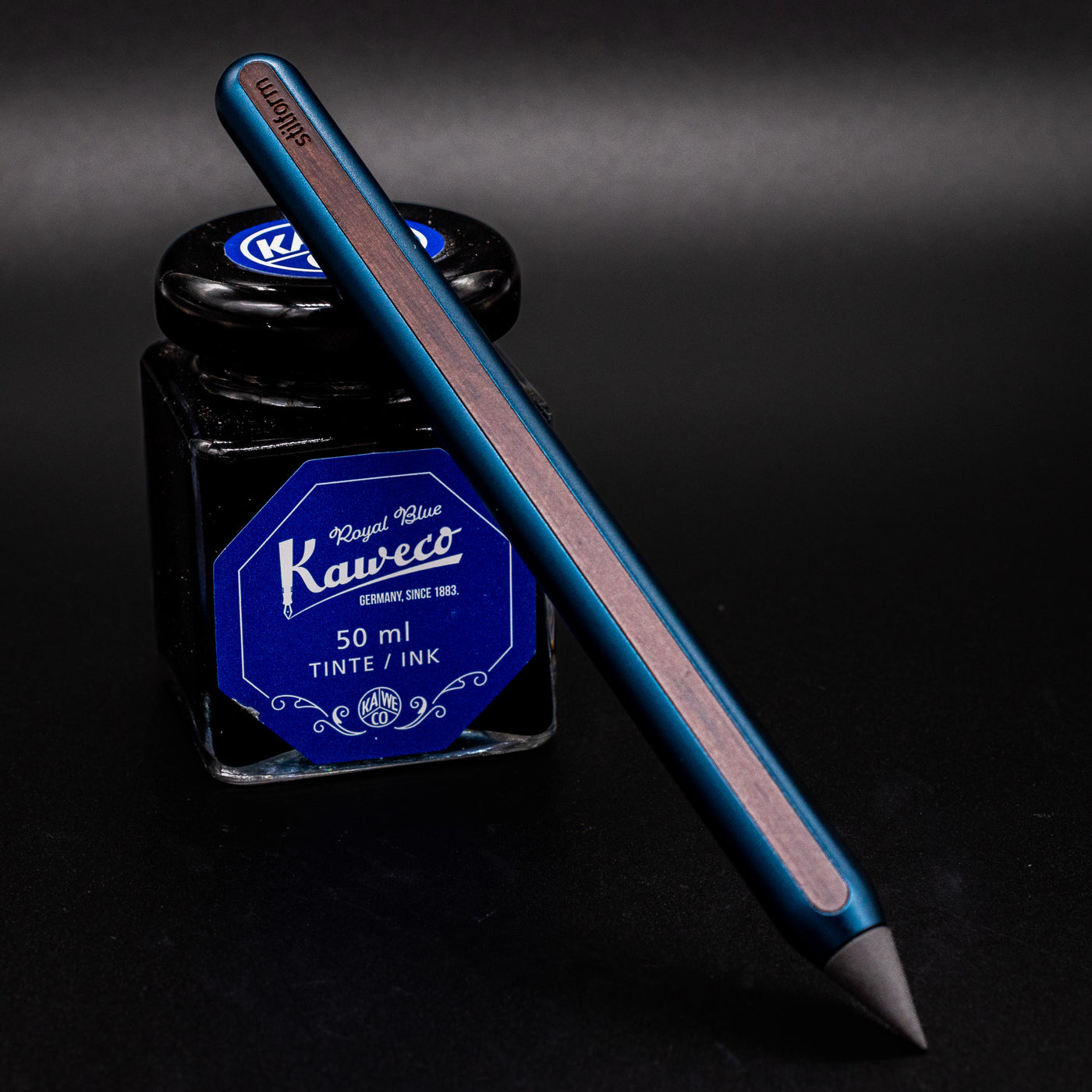 Stilform AEON Pencil Night Sky Aluminum - leaning on ink bottle