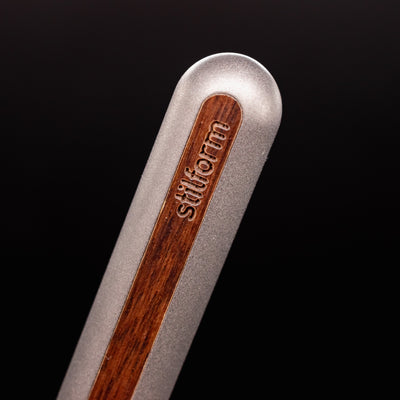 Stilform AEON Pencil Titanium Matte - closeup of Stilform logo on barrel