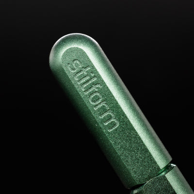 Stilform ARC Gel Pen Aurora Green - closeup of Stilform logo on barrel