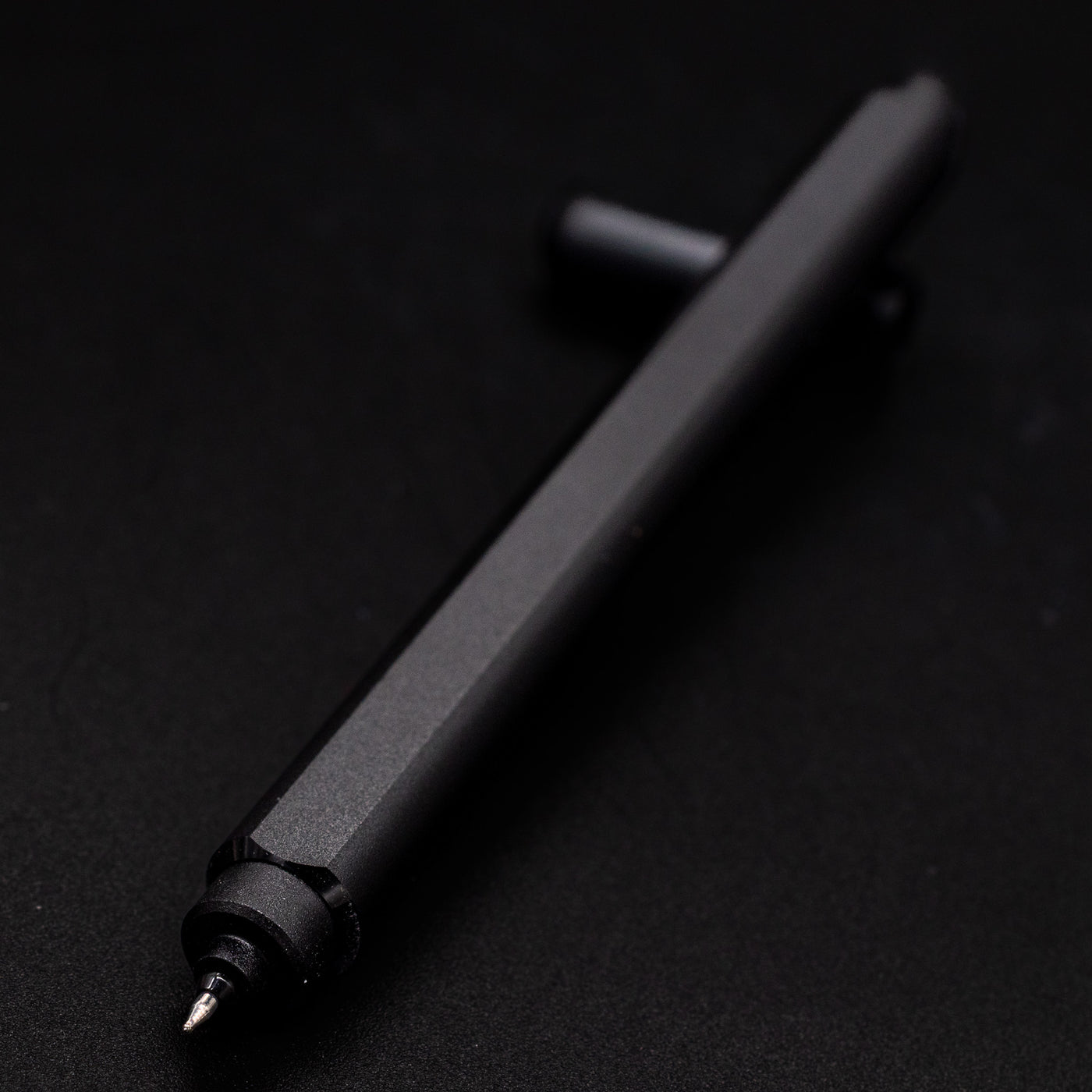 Stilform ARC Gel Pen Titanium DLC - tip closeup, uncapped and leaning toward camera