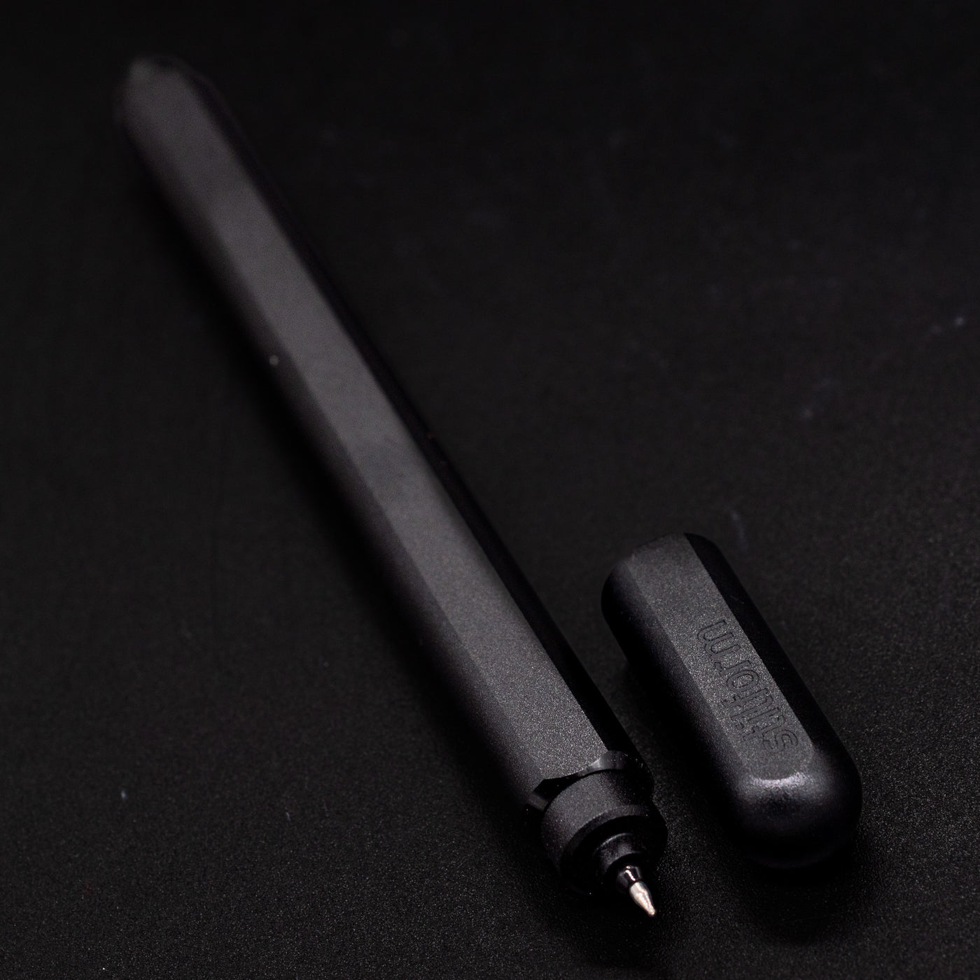 Stilform ARC Gel Pen Titanium DLC - uncapped angled view from overhead