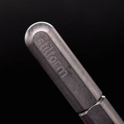 Stilform ARC Gel Pen Titanium Matte - closeup of Stilform logo on barrel