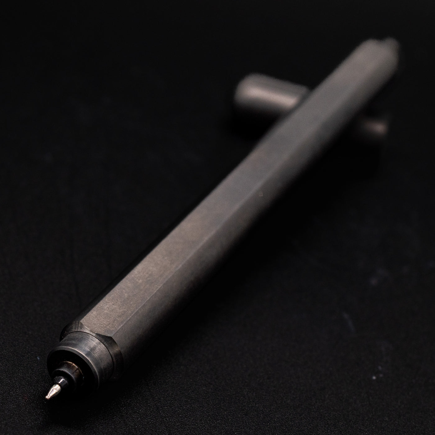 Stilform ARC Gel Pen Titanium Matte - tip closeup, uncapped and leaning toward camera