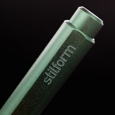 Stilform FLOW Rollerball Pen Aurora Green - closeup of Stilform logo on barrel