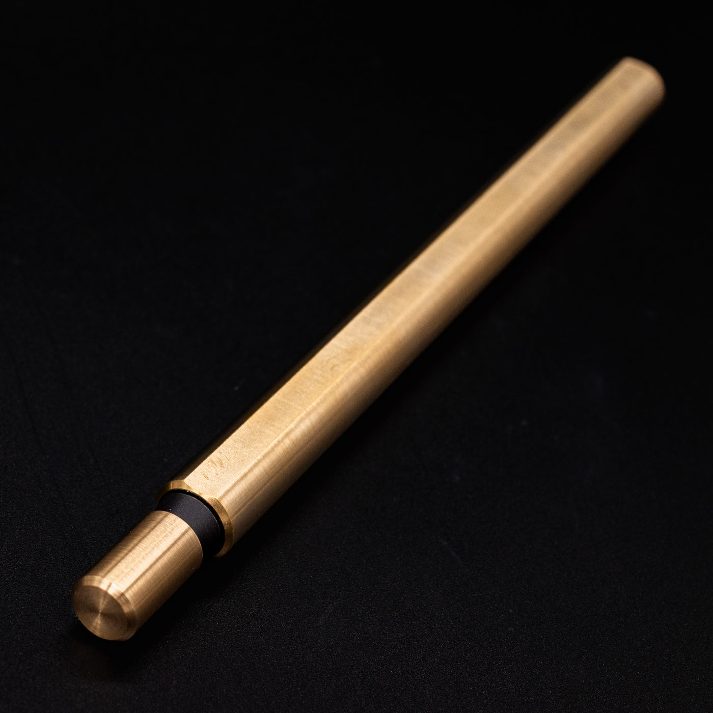 Stilform FLOW Rollerball Pen Brass Radial Brushed - closeup view of end cap