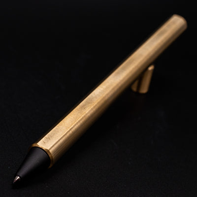 Stilform FLOW Rollerball Pen Brass Radial Brushed - closeup of rollerball tip angled at camera