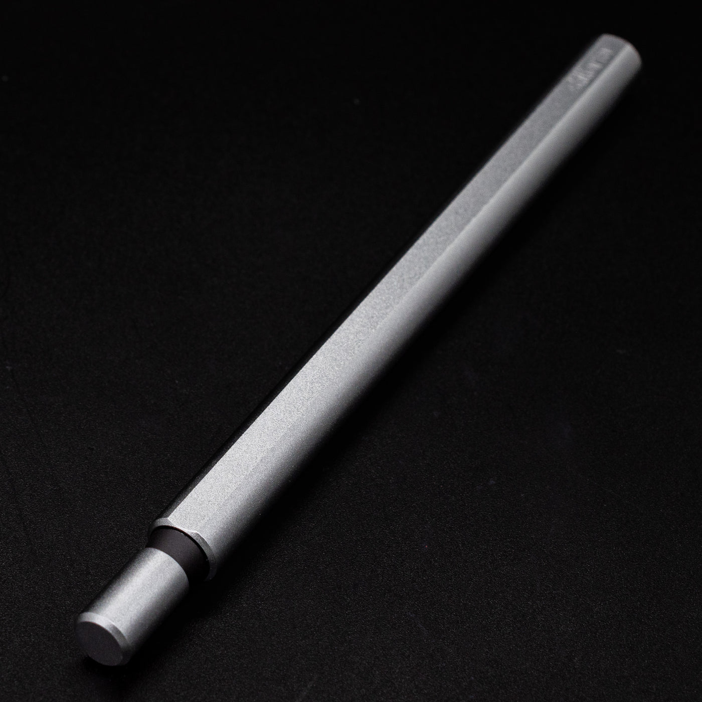 Stilform FLOW Rollerball Pen Comet Grey- closeup view of end cap