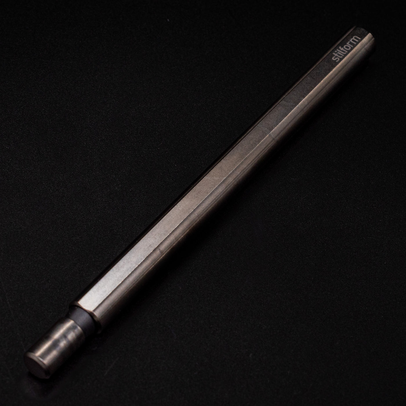 Stilform FLOW Rollerball Pen Titanium DLC - closeup view of end cap