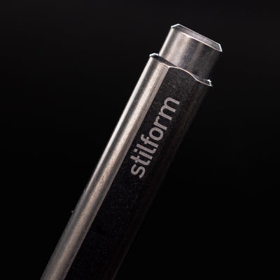 Stilform FLOW Rollerball Pen Titanium DLC - closeup of Stilform logo on barrel
