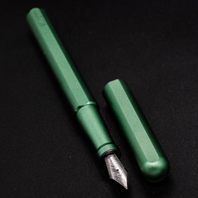 Stilform INK Fountain Pen Aurora Green – uncapped angled view from overhead