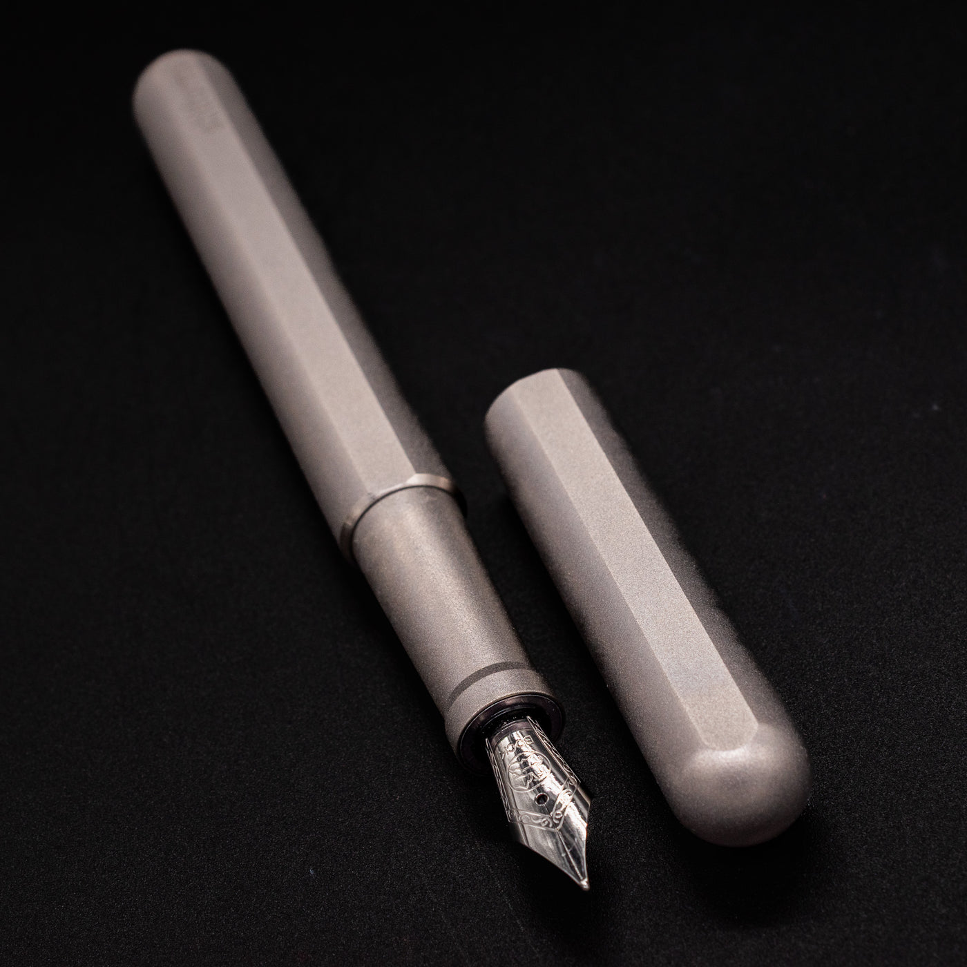 Stilform INK Fountain Pen Comet Grey – uncapped angled view from overhead