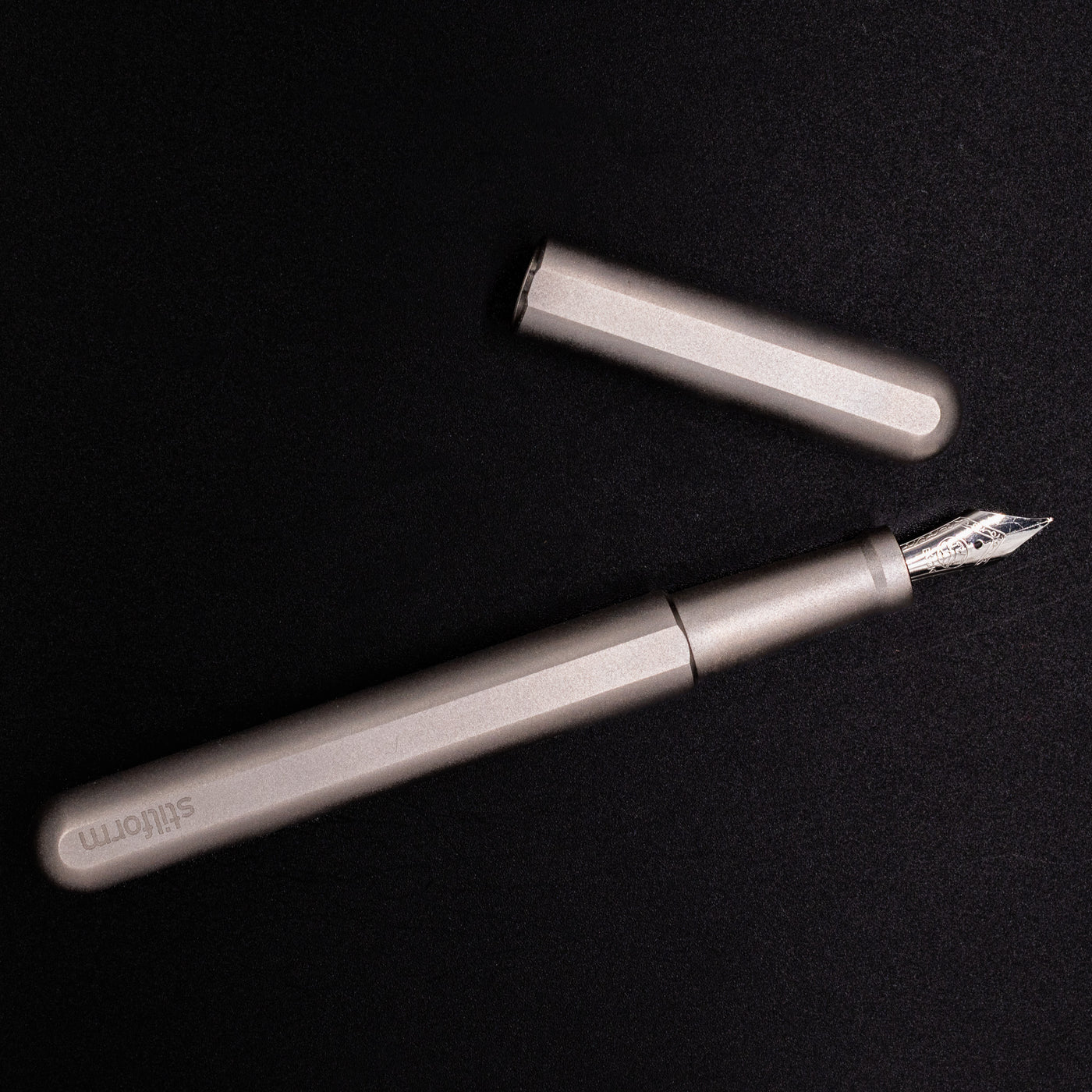 Stilform INK Fountain Pen Comet Grey – full overhead view, uncapped