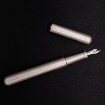 Stilform INK Fountain Pen Comet Grey – full overhead view, uncapped