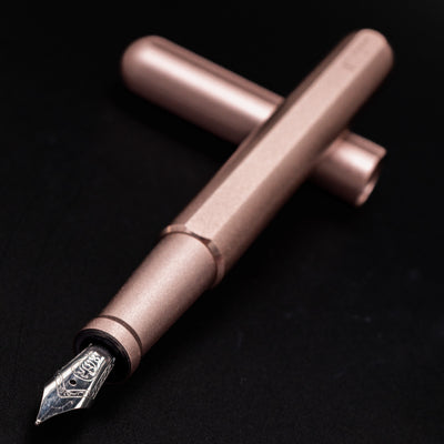 Stilform INK Fountain Pen Rose Moon Aluminum – nib closeup, uncapped and leaning toward camera