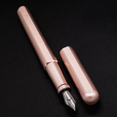 Stilform INK Fountain Pen Rose Moon Aluminum – uncapped angled view from overhead