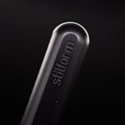 Stilform INK Fountain Pen Titanium DLC – closeup of Stilform logo on barrel