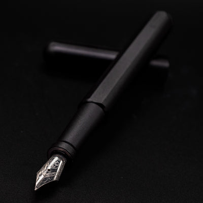 Stilform INK Fountain Pen Titanium DLC – nib closeup, uncapped and leaning toward camera