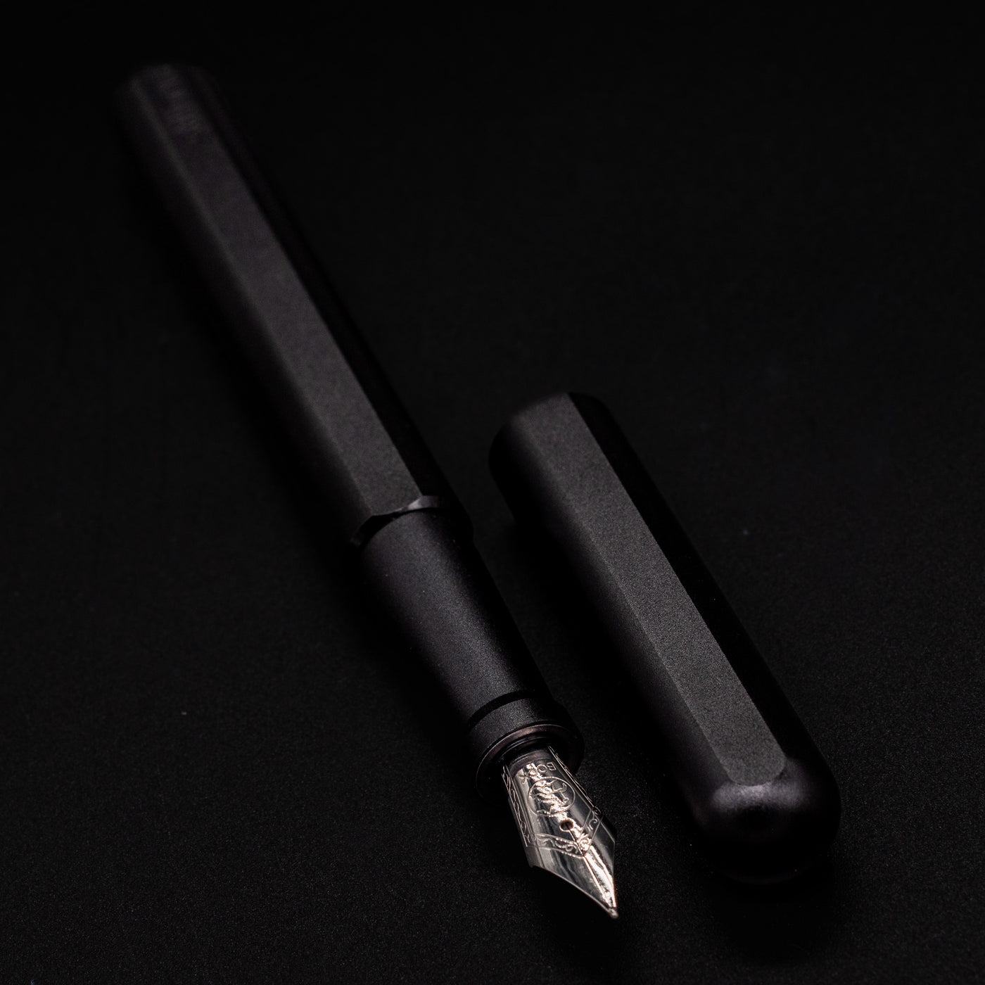 Stilform INK Fountain Pen Titanium DLC – uncapped angled view from overhead
