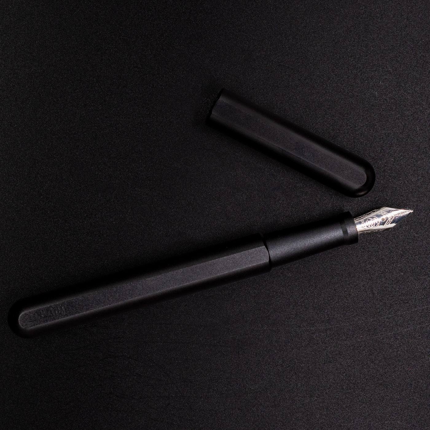 Stilform INK Fountain Pen Titanium DLC – full overhead view, uncapped