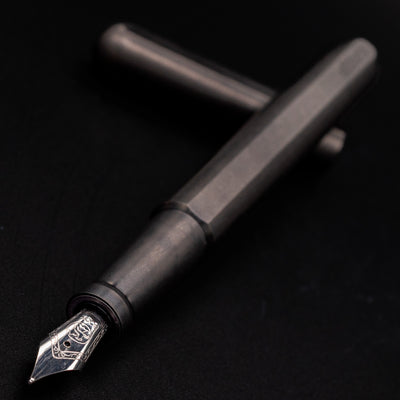 Stilform INK Fountain Pen Titanium Matte – nib closeup, uncapped and leaning toward camera