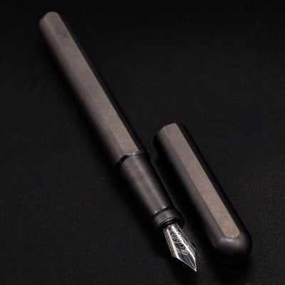 Stilform INK Fountain Pen Titanium Matte – uncapped angled view from overhead