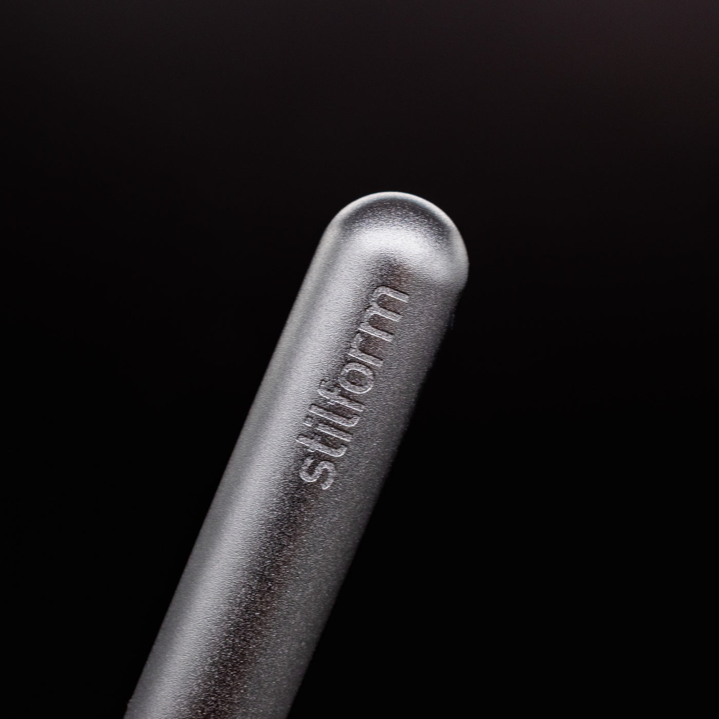 Stilform PEN Ballpoint Pen Comet Grey - closeup of Stilform logo on barrel