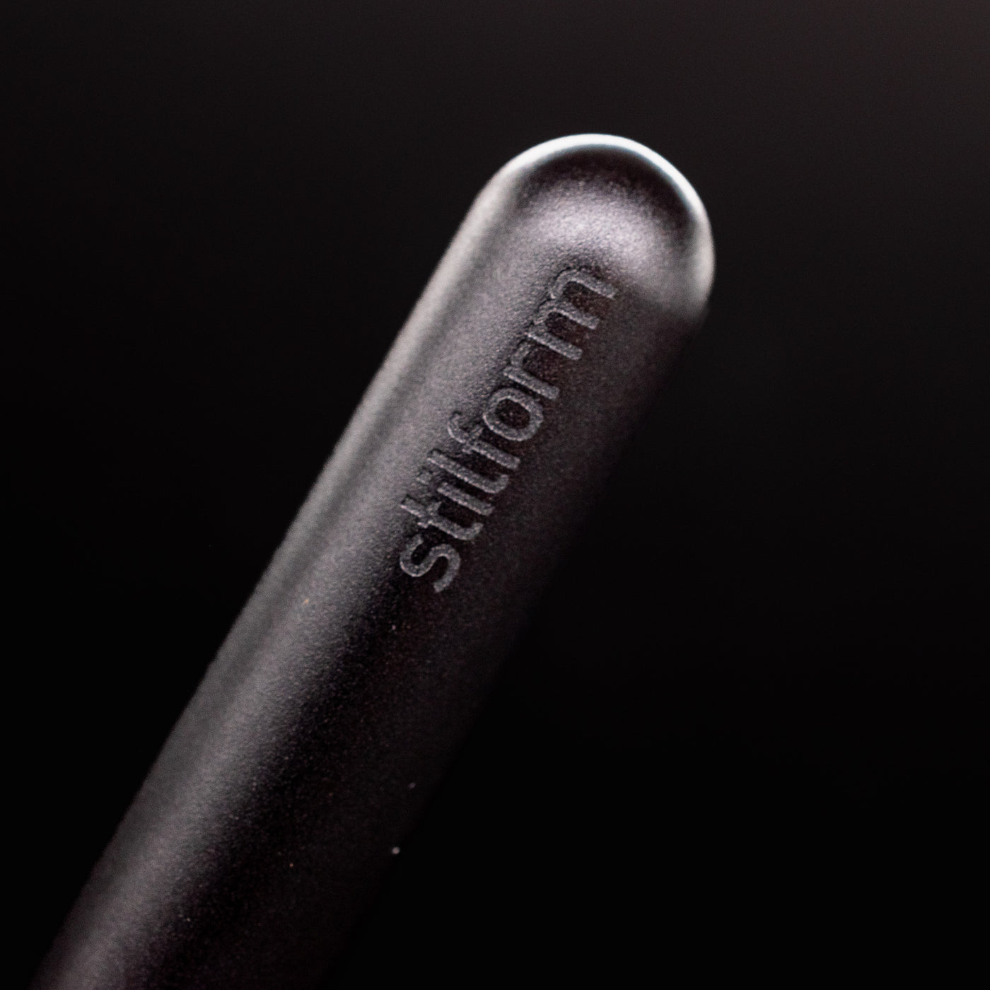 Stilform PEN Ballpoint Pen Warp Black - closeup of Stilform logo on barrel