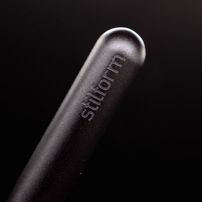 Stilform PEN Ballpoint Pen Warp Black - closeup of Stilform logo on barrel