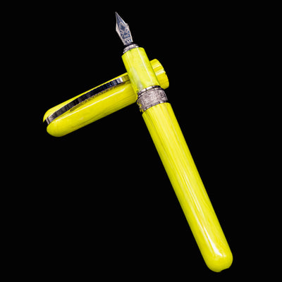 Full-length uncapped Visconti Breeze Fountain Pen in Lemon with clip and nib visible