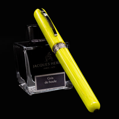 Top-down view of the Visconti Breeze Fountain Pen in Lemon with cap off and clip facing upward