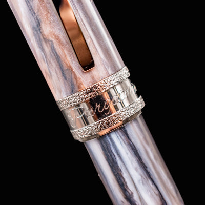 Close-up of Visconti Comedia Purgatorio cap band engraved with “Purgatorio” and textured trim